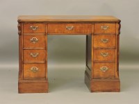 Lot 397 - A Victorian style mahogany kneehole desk