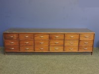 Lot 431 - An early mid 20th century low chest of drawers