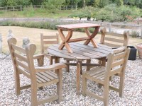 Lot 548 - A circular garden table