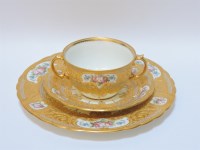 Lot 72 - A Royal Crown Derby porcelain parcel gilt trio