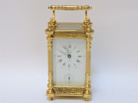 Lot 76 - A brass carriage clock