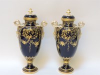 Lot 165 - A pair of Minton porcelain vases and covers