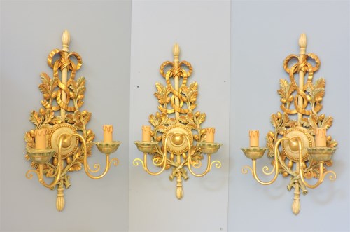 Lot 166 - A set of three modern green and gilt painted twin branch wall lights