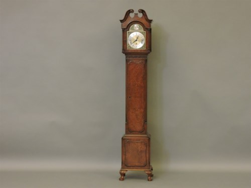 Lot 505 - A reproduction burr walnut grandmother clock