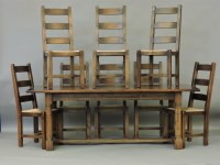 Lot 485 - A George III style oak refectory table