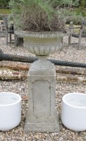 Lot 579 - A composite garden urn