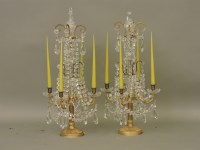 Lot 302 - A pair of late 19th/early 20th century four light candelabra