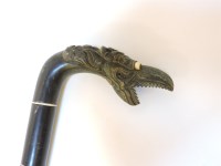Lot 180 - A Chinese sectional horn walking stick