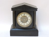 Lot 195 - A slate mantel clock