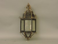 Lot 316 - A late 19th century pierced and pressed metal hall lantern