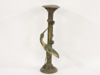 Lot 474 - A Black Forest painted papier mâché and carved wood stand