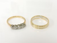 Lot 11 - An 18ct gold two colour gold wedding ring