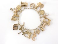 Lot 20 - A gold charm bracelet