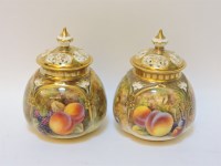 Lot 173 - A pair of small Royal Worcester pot pourri vases