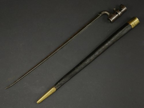 Lot 181 - A British Brown Bess bayonet in leather scabbard