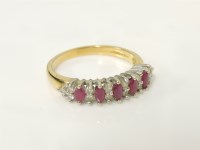 Lot 3 - An 18ct gold five stone marquise cut ruby ring