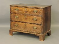 Lot 430 - A Georgian oak three drawer chest