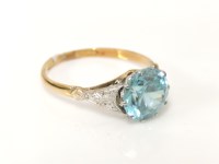 Lot 4 - A gold single stone blue zircon ring