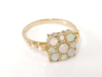 Lot 45 - A 9ct gold opal square cluster ring