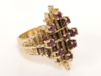 Lot 47 - A 9ct gold ruby dispersed cluster ring