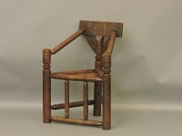 Lot 427 - An early 16th century style oak Warwick chair