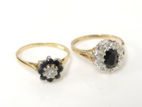 Lot 36 - An 18ct gold sapphire and diamond cluster ring