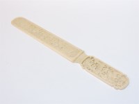 Lot 88 - A 19th century Chinese finely carved ivory page turner