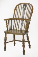 Lot 380 - A yew wood Windsor armchair