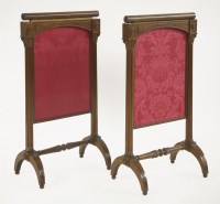 Lot 405 - A pair of Regency oak fire screens