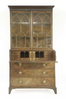 Lot 409 - A George III mahogany secretaire bookcase cabinet