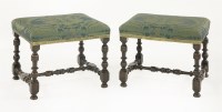 Lot 501 - A pair of French walnut footstools