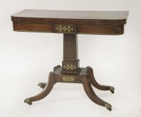 Lot 416 - A Regency rosewood and brass inlaid card table