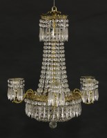 Lot 532 - A cut glass and gilt bronze six-branch chandelier