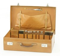 Lot 87 - A tan leather gentleman's travelling case