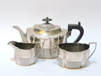 Lot 119 - A silver three piece teaset