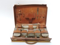 Lot 137 - A gentleman's silver mounted travelling dressing table set