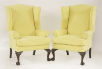 Lot 407 - A pair of Georgian-style wing armchairs