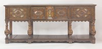 Lot 379 - An antique and later oak dresser base