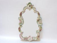 Lot 232 - A porcelain framed dressing mirror