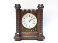 Lot 234 - An Arts and Crafts mantel clock