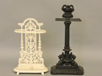 Lot 438 - Two small iron umbrella stands