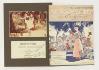 Lot 91 - SNOW WHITE AND THE SEVEN DWARFS:
Mounted picture/Programme