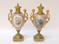 Lot 124 - A pair of French pink porcelain and ormolu vases