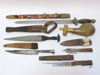 Lot 106 - Five various daggers in scabbards