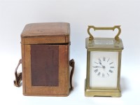 Lot 144 - A gilt brass carriage clock