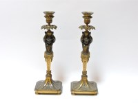 Lot 214 - A pair of gilt bronze candlesticks