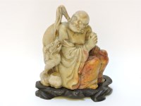 Lot 143 - A Chinese soapstone figure