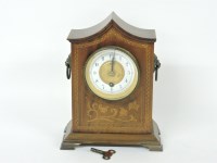 Lot 180 - An Edwardian inlaid mahogany mantel clock