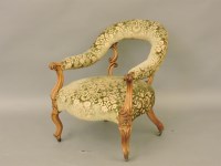 Lot 535 - A Victorian walnut horseshoe backed occasional chair