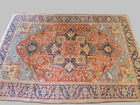 Lot 537 - A Heriz carpet